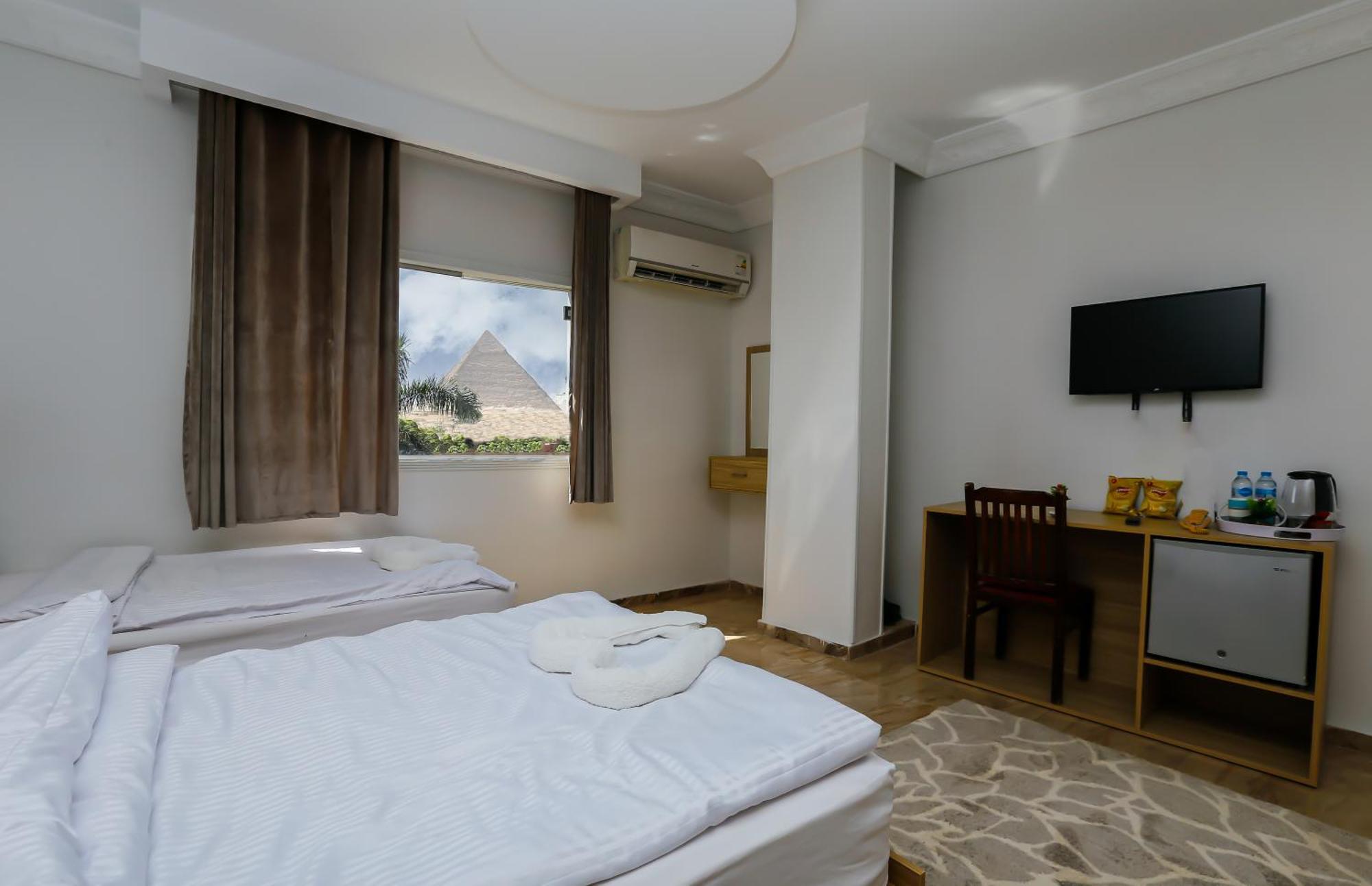 Pyramids Express View Hotel Kafrat al Jabal ภายนอก รูปภาพ
